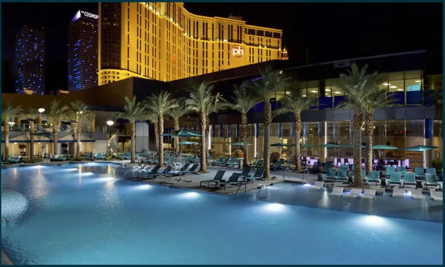 Las Vegas resort pool lit up at night