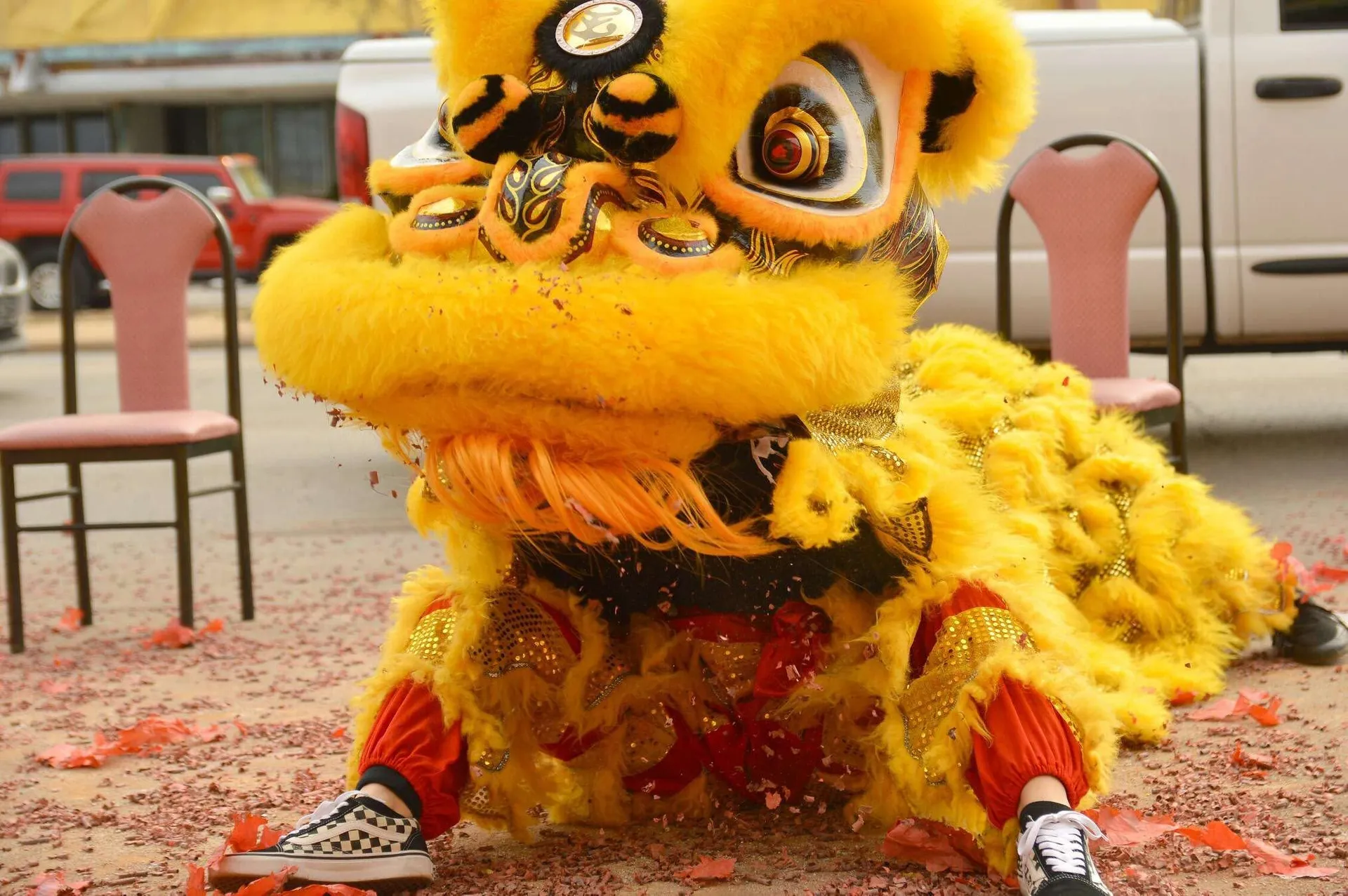 Hung Viet lion dance performance in vibrant gold and orange